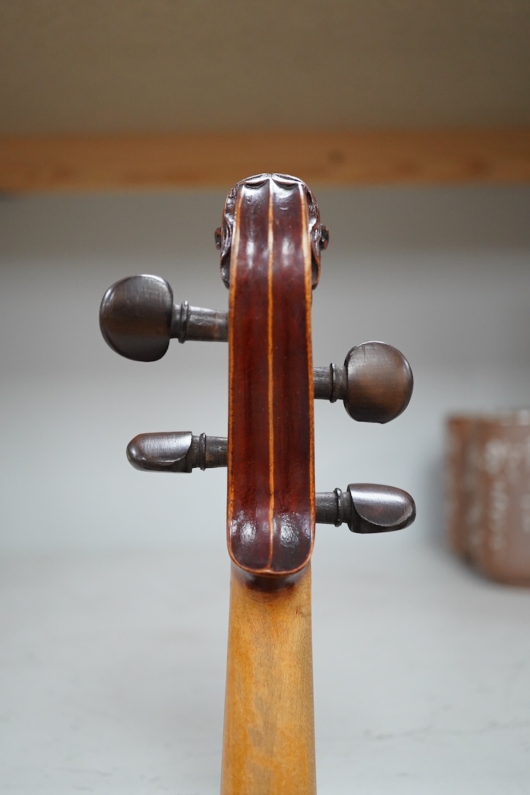 A cased late 19th century German Mittenwald violin with lion’s head scroll, and two bows, Ivory submission ref: RP2E5HT1